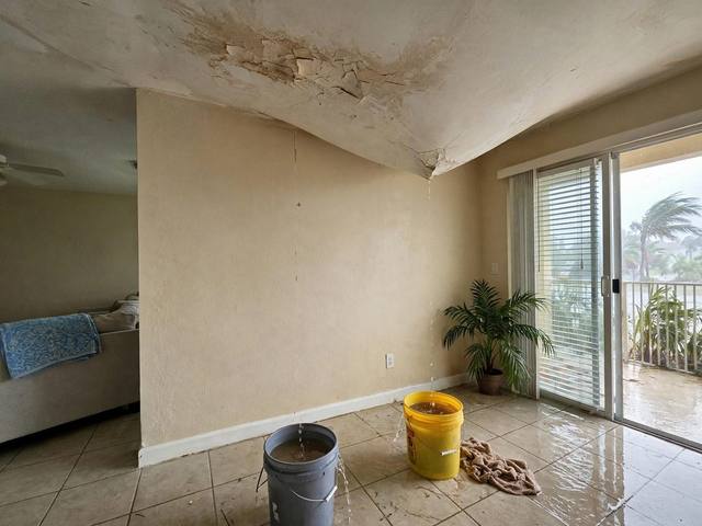 Storm Damage Restoration before photo Naples FL illustrative example